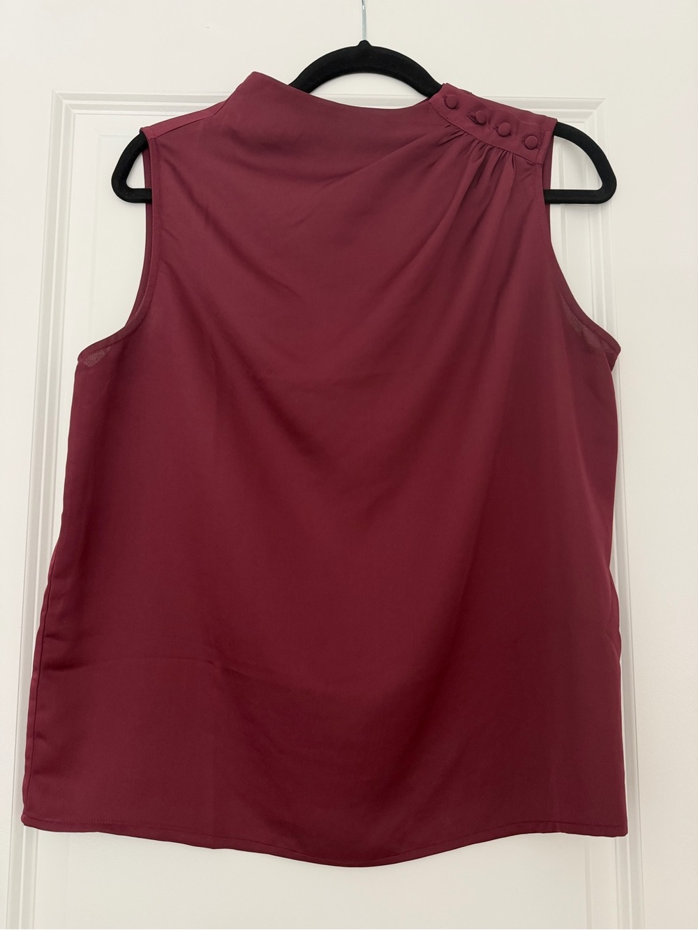 Sleeveless Mock Neck Blouse with Button Shoulder Detail in Burgundy